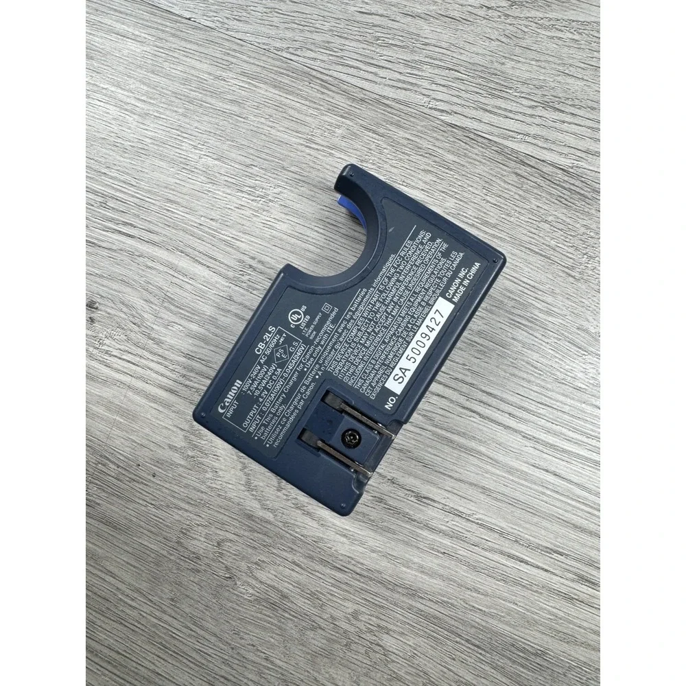 Canon OEM battery charger CB-2LS Power Shot S100 S200 S300 S400 S410 S500 876